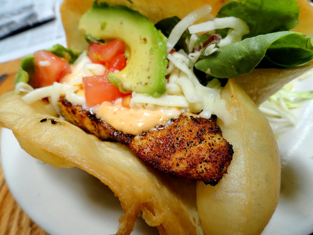 Trini's signature dishes The “Big Juan”Diablo StewChicken Puffy Tacos